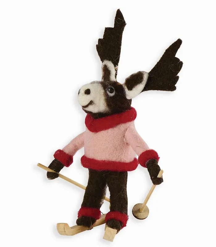 Cerf skieur avec pull rose